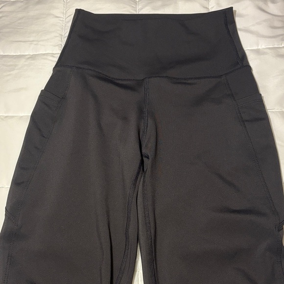 Black Yoga Flare Pants with Pockets and Wide Waistband - Picture 2 of 10